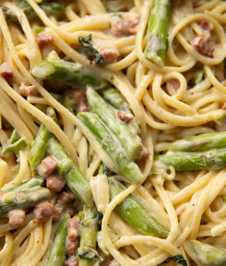close up shot of asparagus pasta in pan