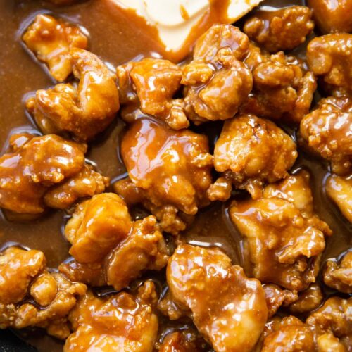 close up shot of salted caramel chicken in pan