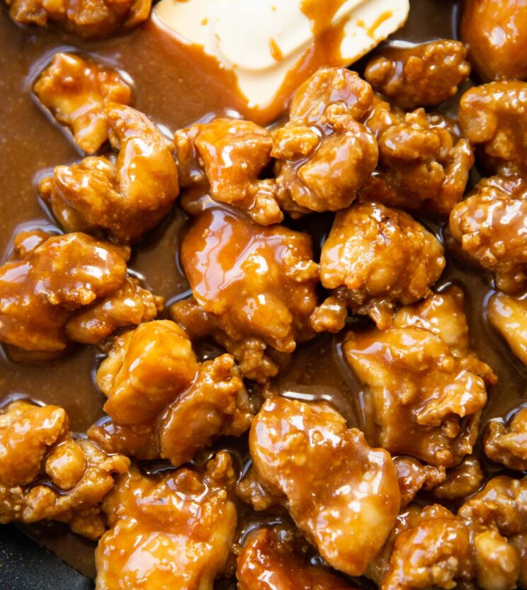 close up shot of salted caramel chicken in pan